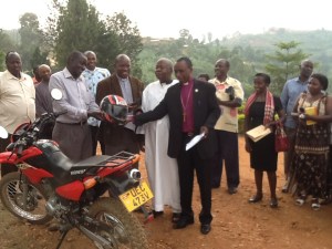 Charles receives his motor-bike!