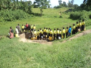 Children queuing for water in Bwambara