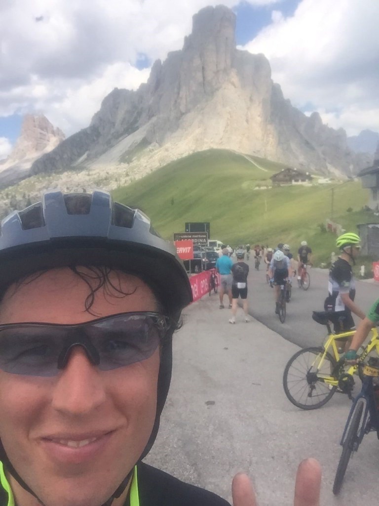 Simon with a mountain behind him