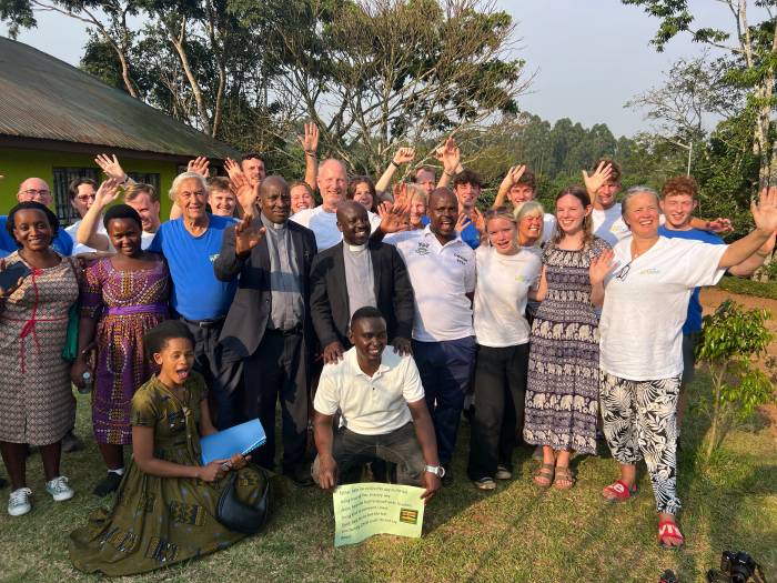St Peters tour team pose with the WATSAN staff team
